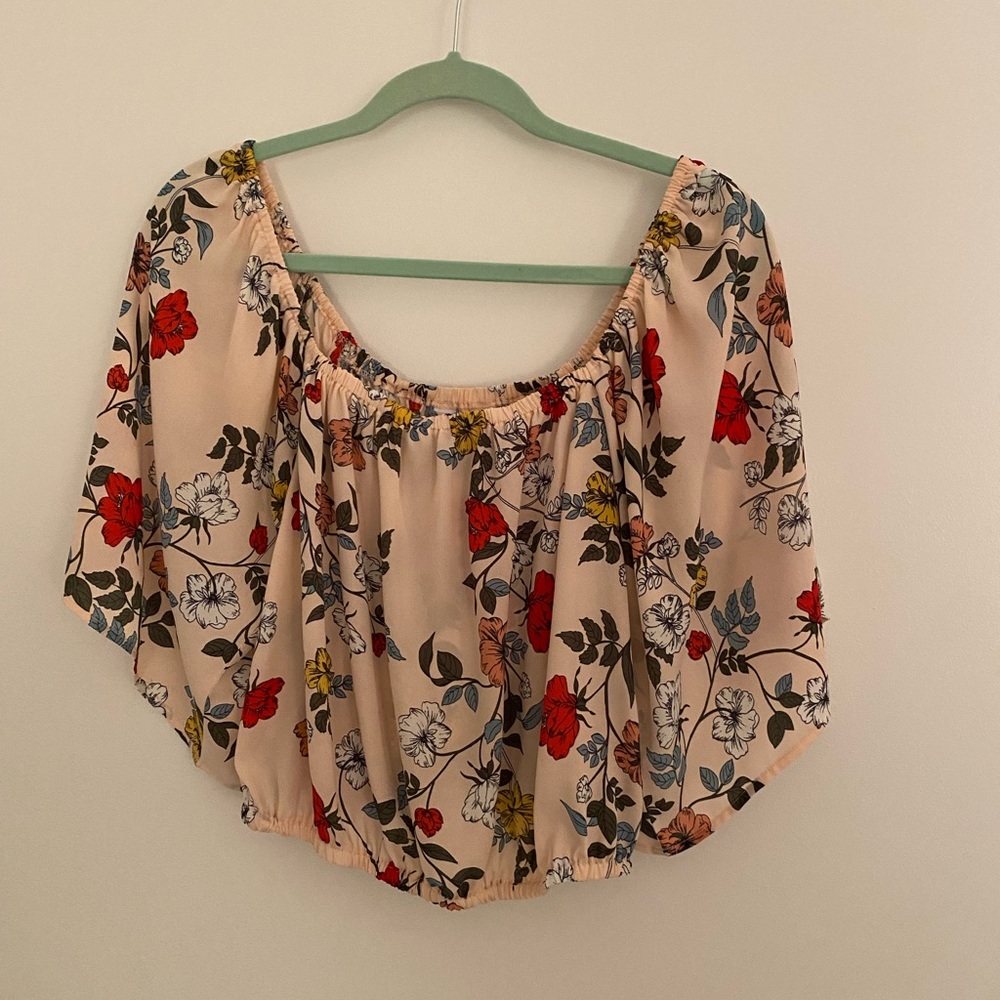 Light pink floral top.